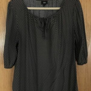 Shirt with ties in front.